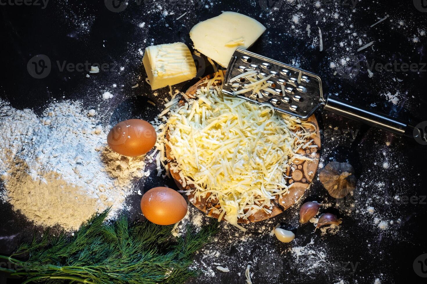 oben Aussicht von ein immer noch Leben von das Prozess von Herstellung Käse Bälle mit Knoblauch und Dill auf ein schwarz Hintergrund foto