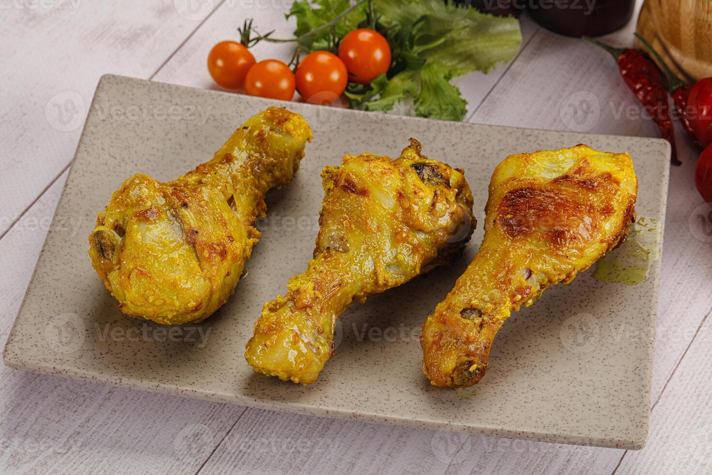 geröstet Hähnchen Bein Trommelstöcke mit Curry Soße foto