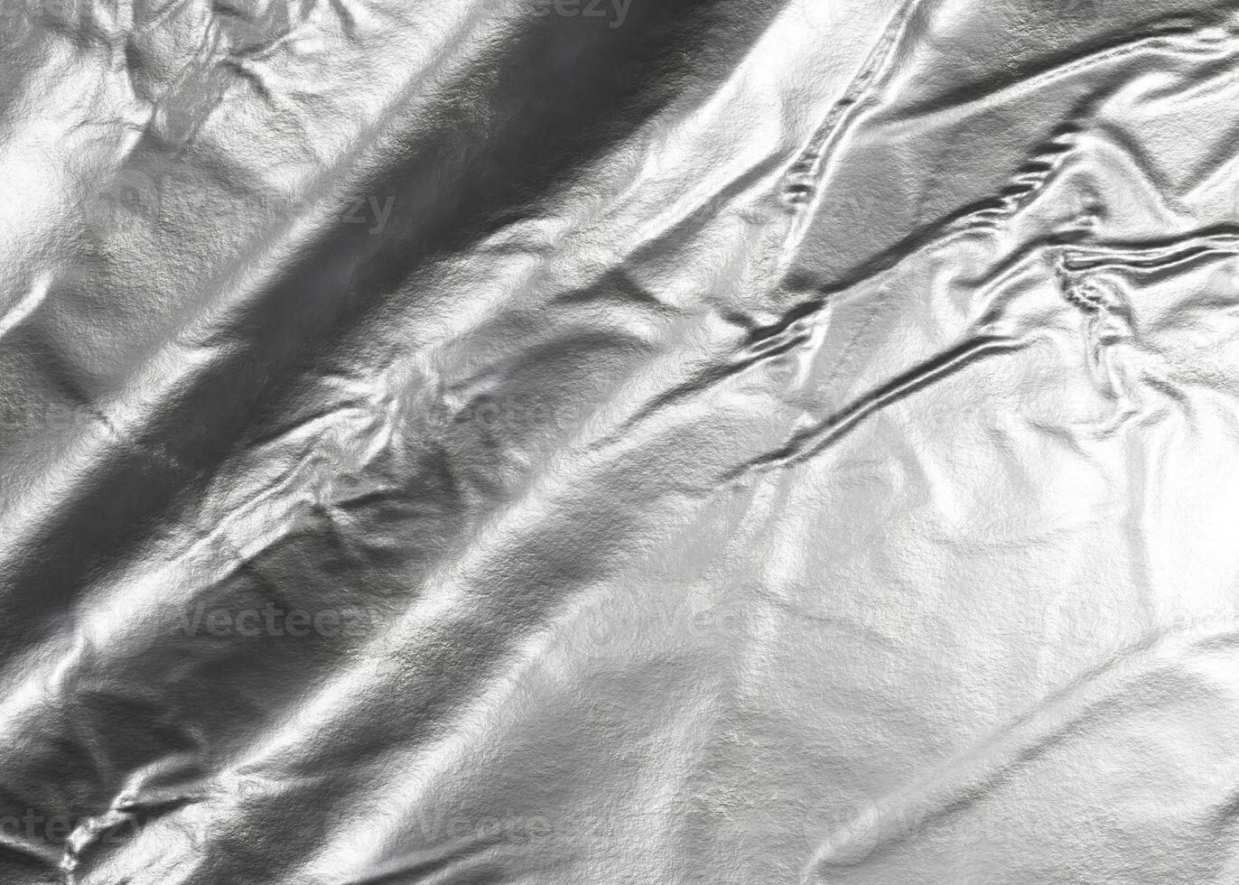 faltig Blatt von zerquetscht Zinn Aluminium Silber vereiteln foto