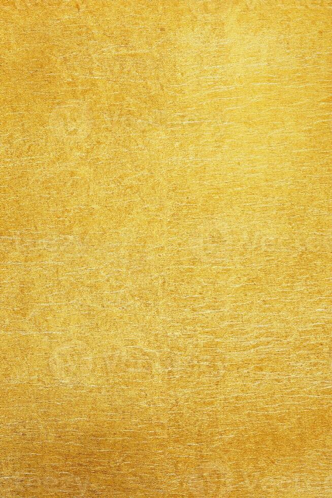 glänzender gelber Blattgoldfolien-Texturhintergrund foto
