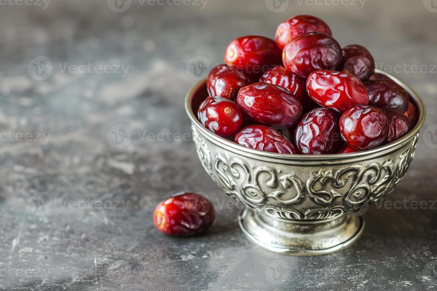 ai generiert roh Datum Obst bereit zu Essen im Silber Schüssel auf Beton Hintergrund. traditionell, köstlich und gesund Ramadan Essen foto