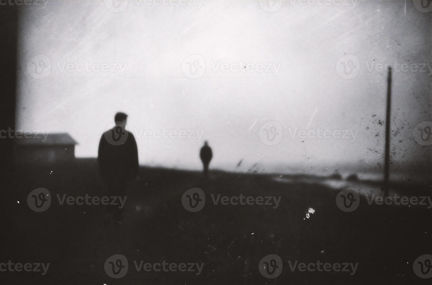 ai generiert verschwommen Silhouette von ein Mann Stehen beim das Strand im das Regen foto