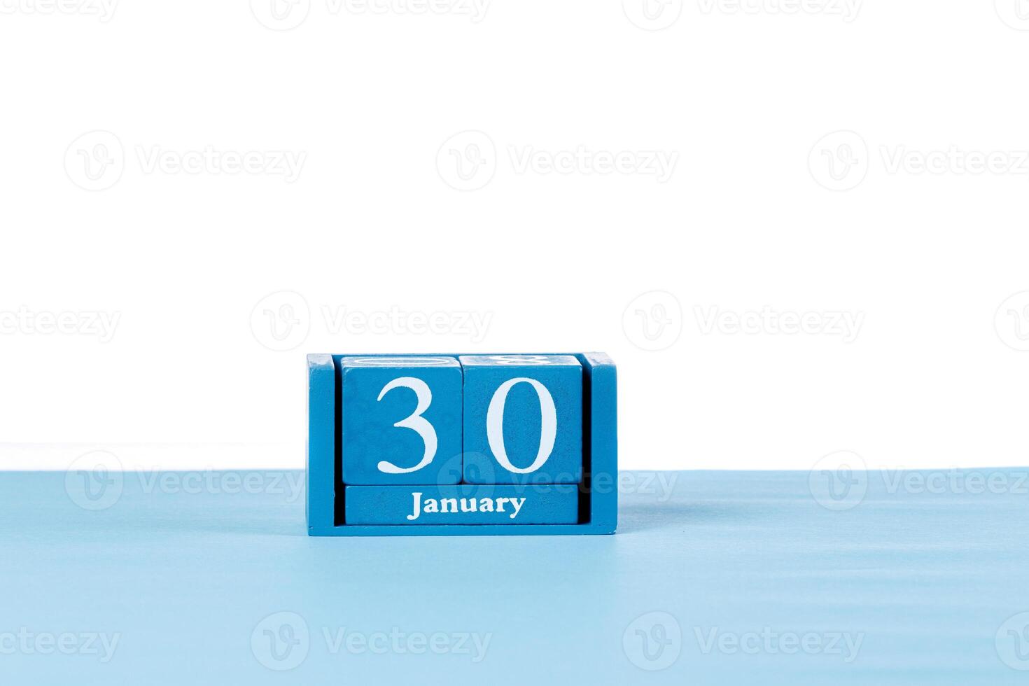 hölzern Kalender Januar 30 auf ein Weiß Hintergrund foto