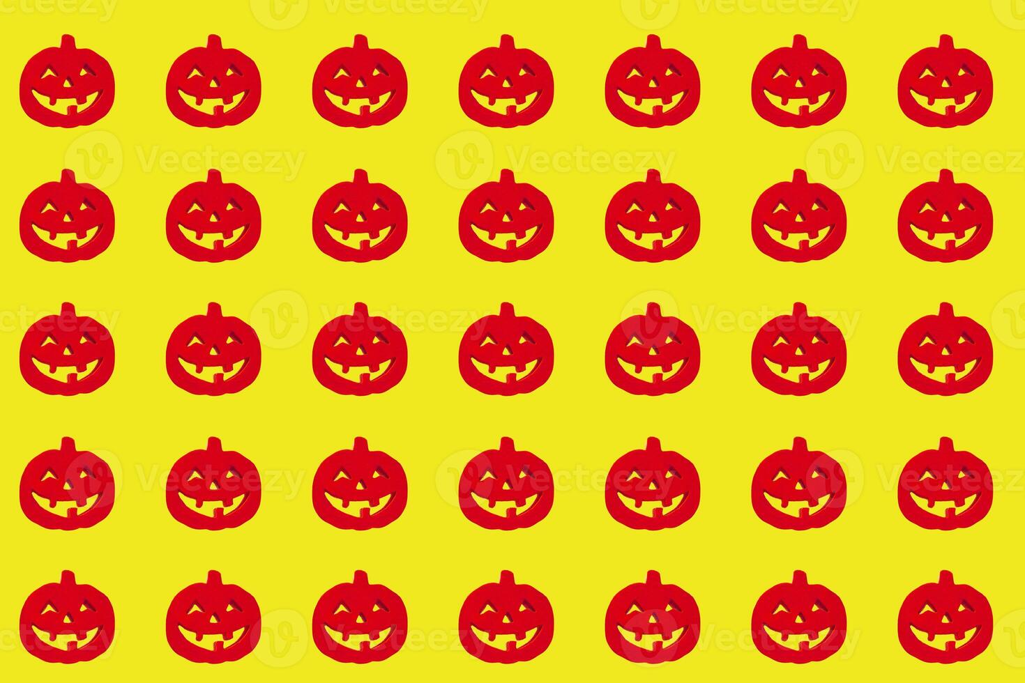 Halloween Kürbisse Muster. viele unheimlich Kürbis Gesichter Hintergrund foto
