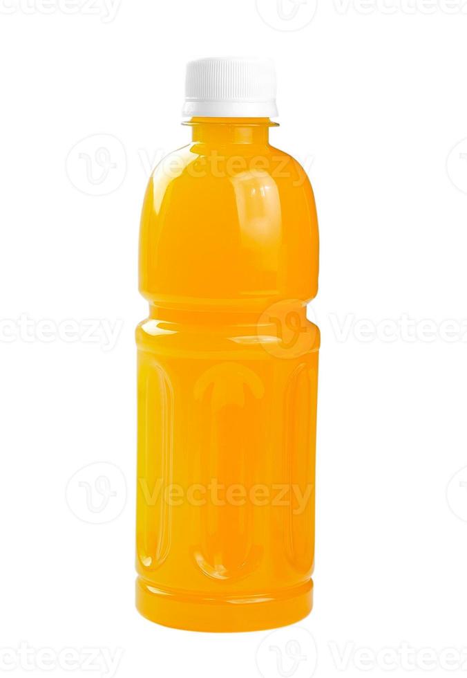 Plastikflasche und Glas Orangensaft foto