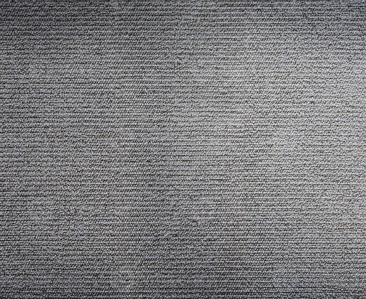 Heidekraut grau Strickwaren Stoff Textur Hintergrund. foto