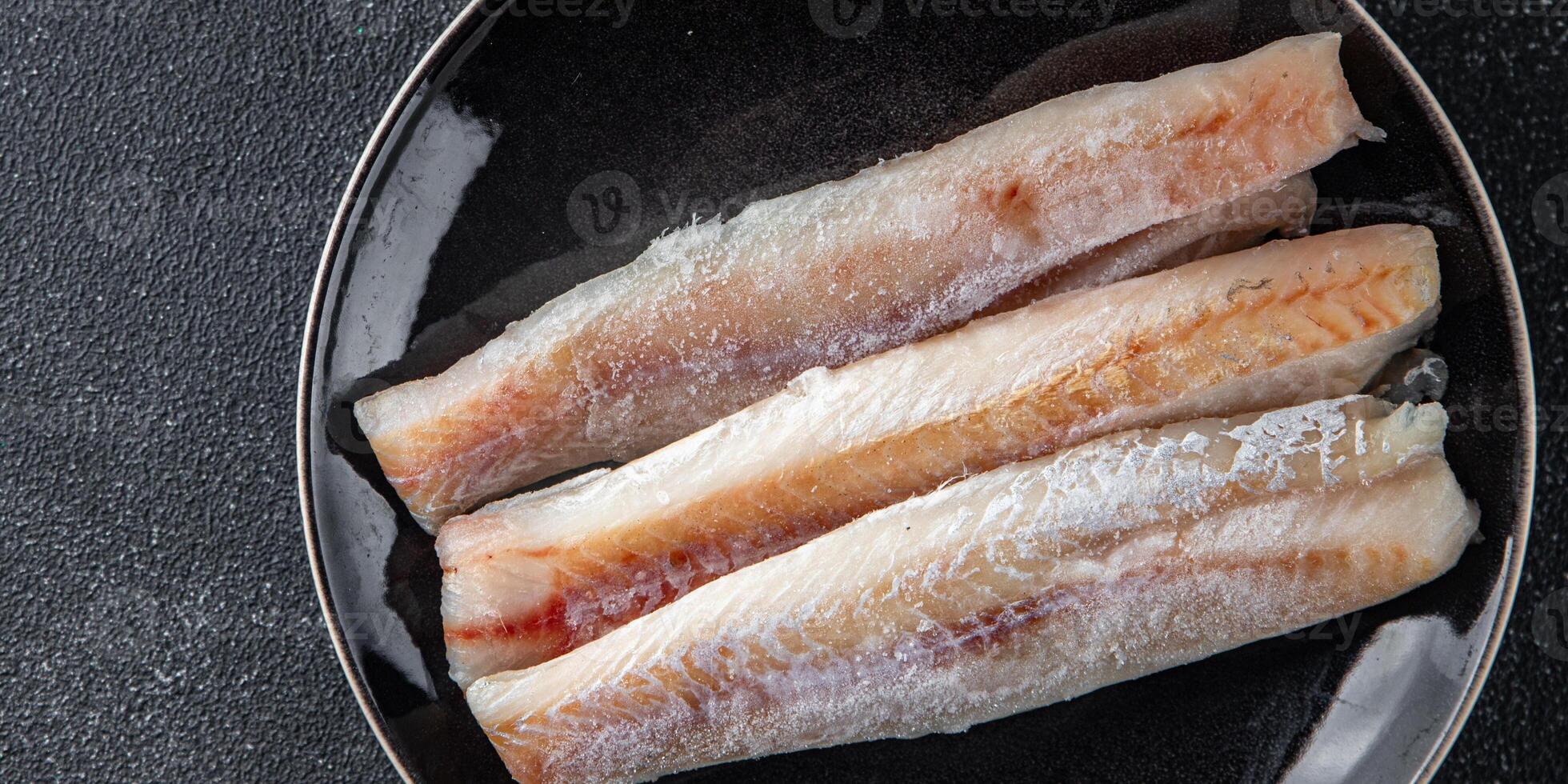 Seehecht Fisch Filet frisch Meeresfrüchte lecker gesund Essen Kochen Vorspeise Mahlzeit Essen Snack auf das Tabelle foto