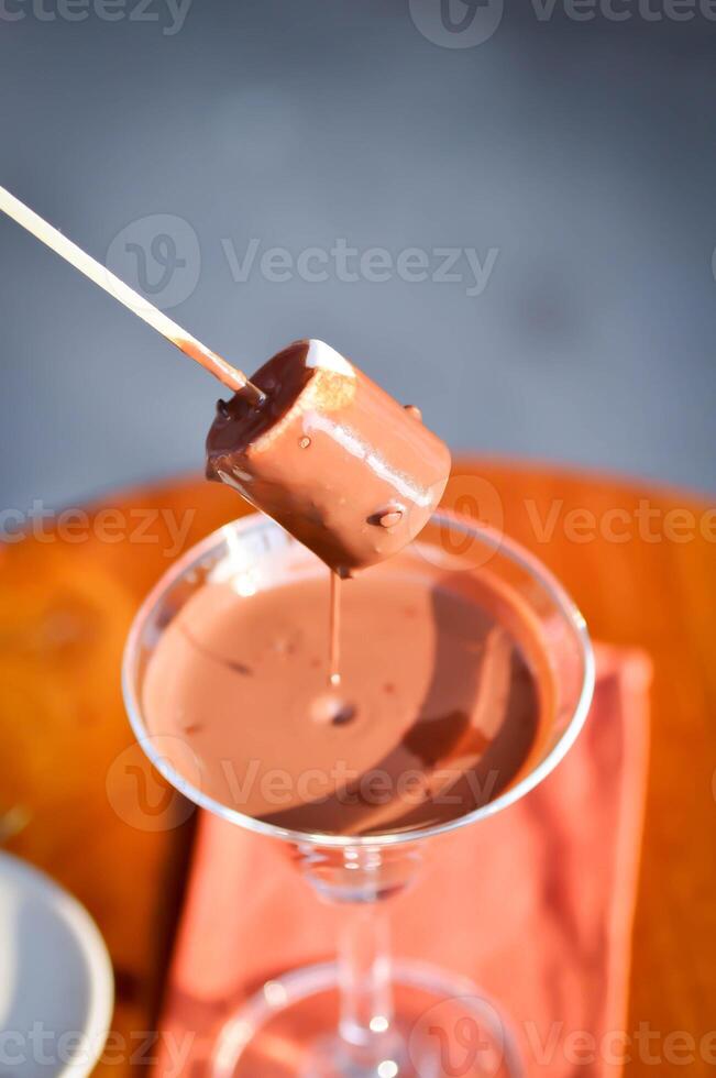 Fondue, Fonduta oder Schokolade Fondue oder Schokolade Fondut und Mäusespeck foto