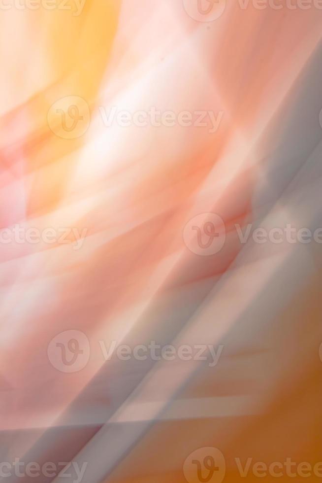abstrakter Hintergrund mit wellenförmigen geraden und diagonalen Linien in orangefarbenen Grautönen. foto