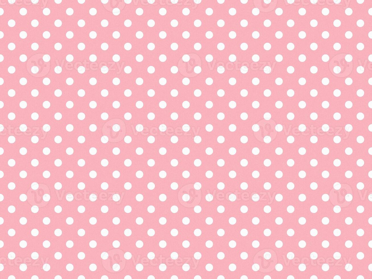 texturiert Weiß Farbe Polka Punkte Über Licht Rosa Hintergrund foto