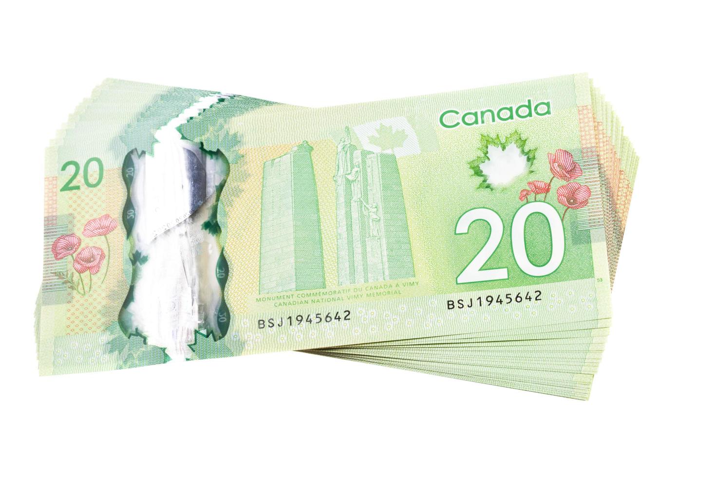 Ottawa, Kanada, 13. April 2013, die neuen Polymer-Zwanzig-Dollar-Scheine, isoliert auf weiss foto