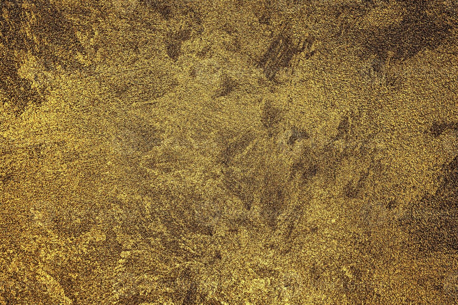 Textur von golden dekorativ Gips oder Beton. abstrakt Gold Grunge Hintergrund. foto