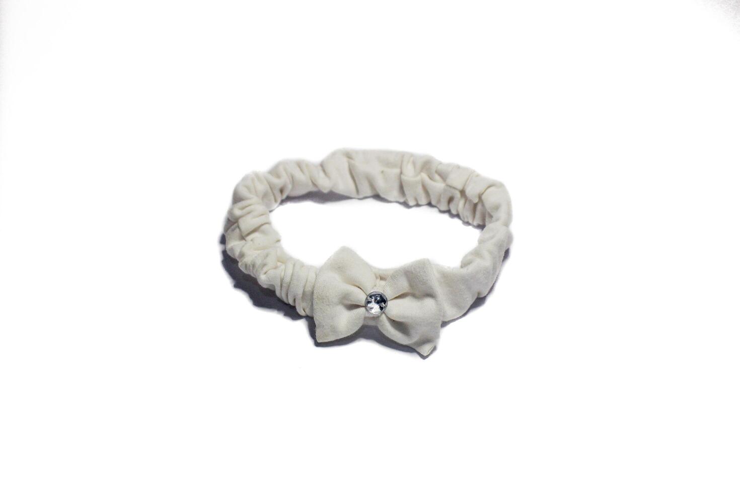 Stirnband, Haarband, oder Halsband mit ein Weiß Blume Form. isoliert Bild foto