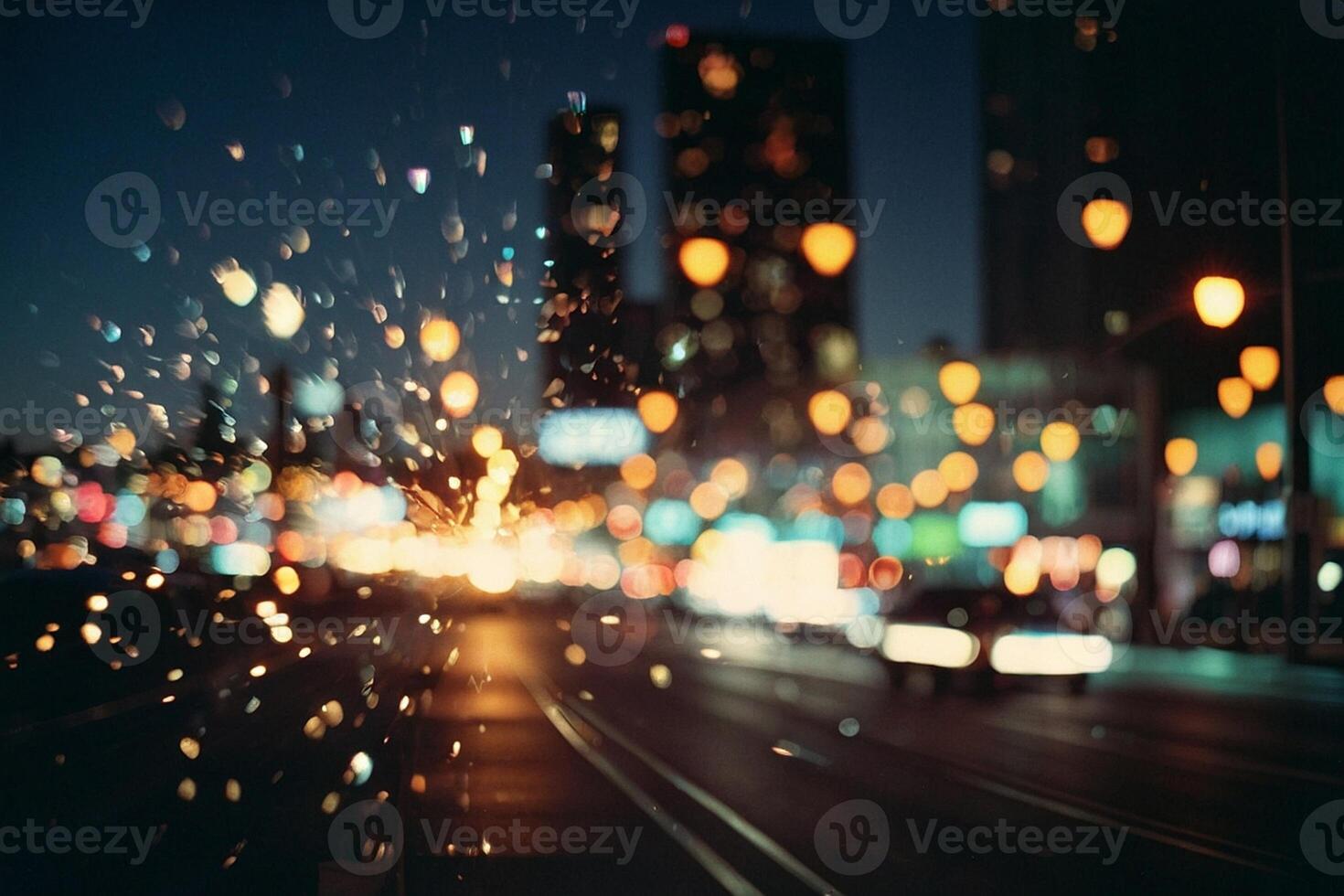 ein Aussicht von das Straße beim Nacht mit Regen Tropfen auf das Fenster foto
