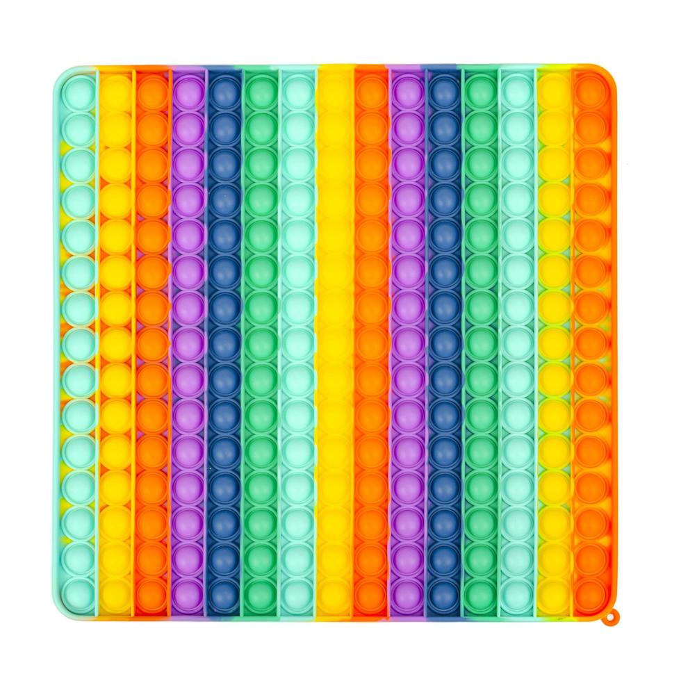 quadratisches schillerndes, mehrfarbiges einfaches Grübchen, knall es. modisches und modernes Anti-Stress-Spielzeug für Kinder und Erwachsene. foto