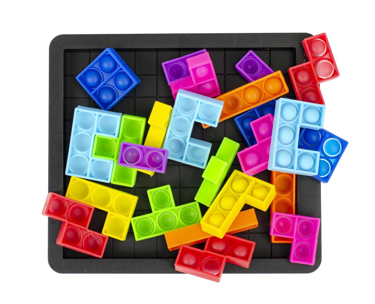 Puzzle einfache Grübchen, knall es. modisches und modernes Anti-Stress-Spielzeug für Kinder und Erwachsene foto