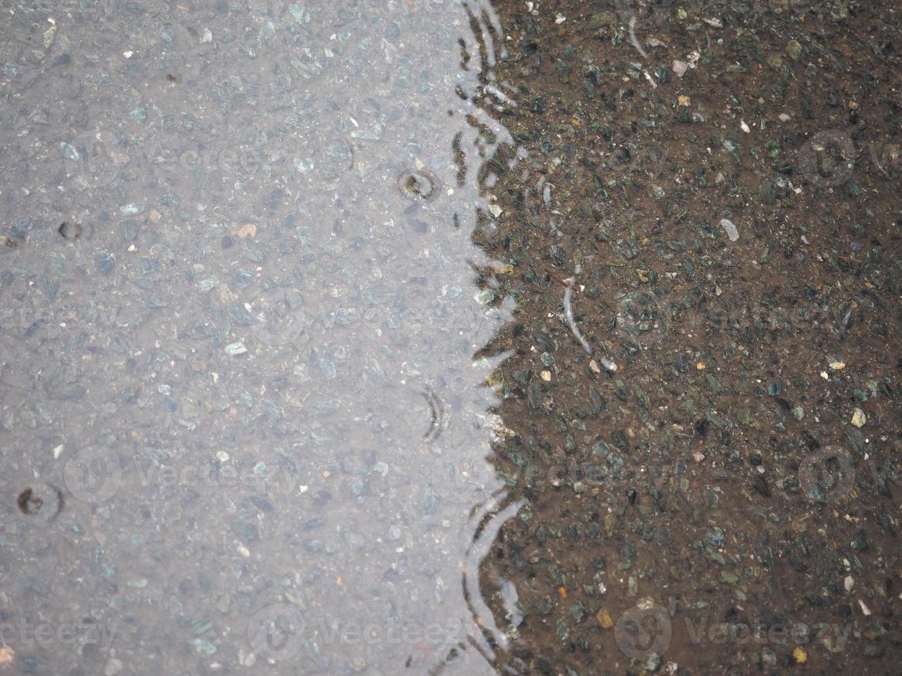 Regenwasserpfütze Hintergrund foto