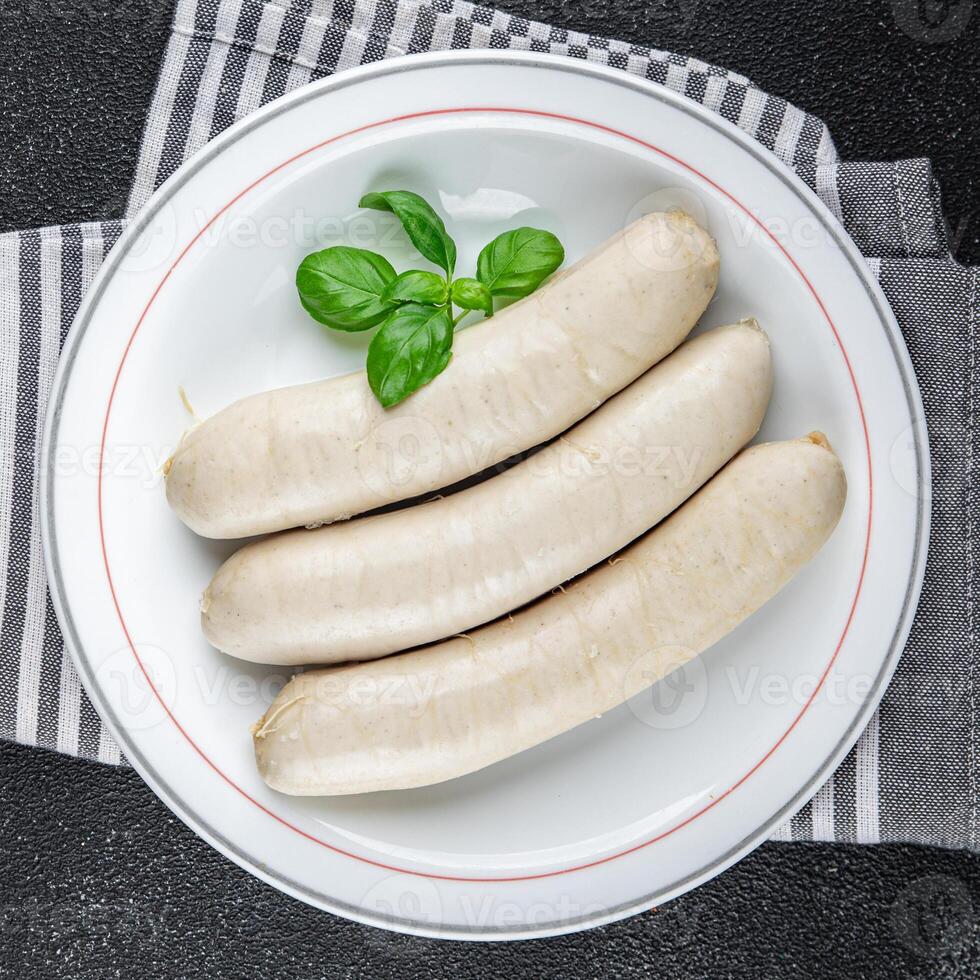 Fleisch Weiß Würstchen Weißwurst bayerisch Würste Kochen Vorspeise Mahlzeit Essen Snack auf das Tabelle foto