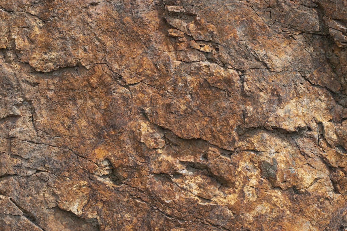 Granitstruktur, rote Basis mit schwarzen und grauen Flecken foto
