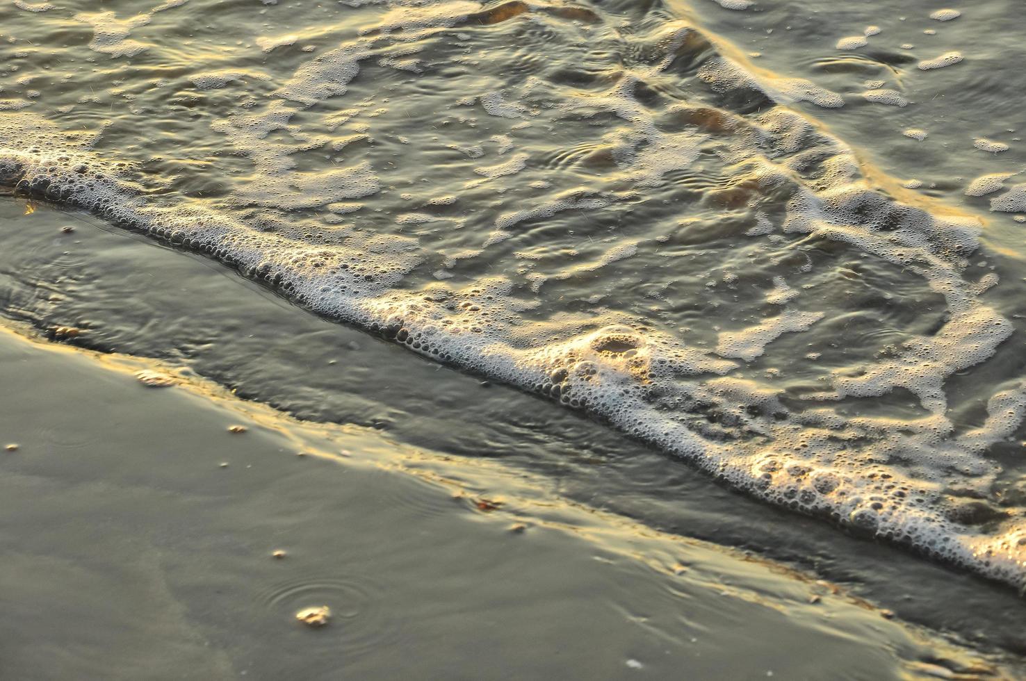 Details zu den Wellen am Strand foto