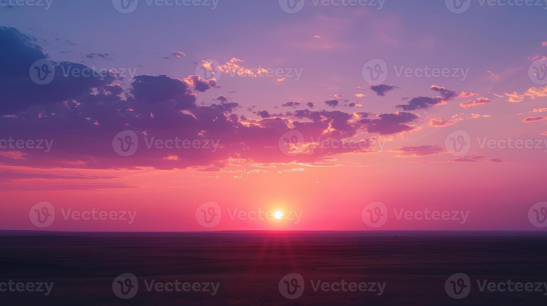 ein atemberaubend Sonnenuntergang auf das Horizont Gemälde das Himmel mit Rosa Orangen und Purpur foto