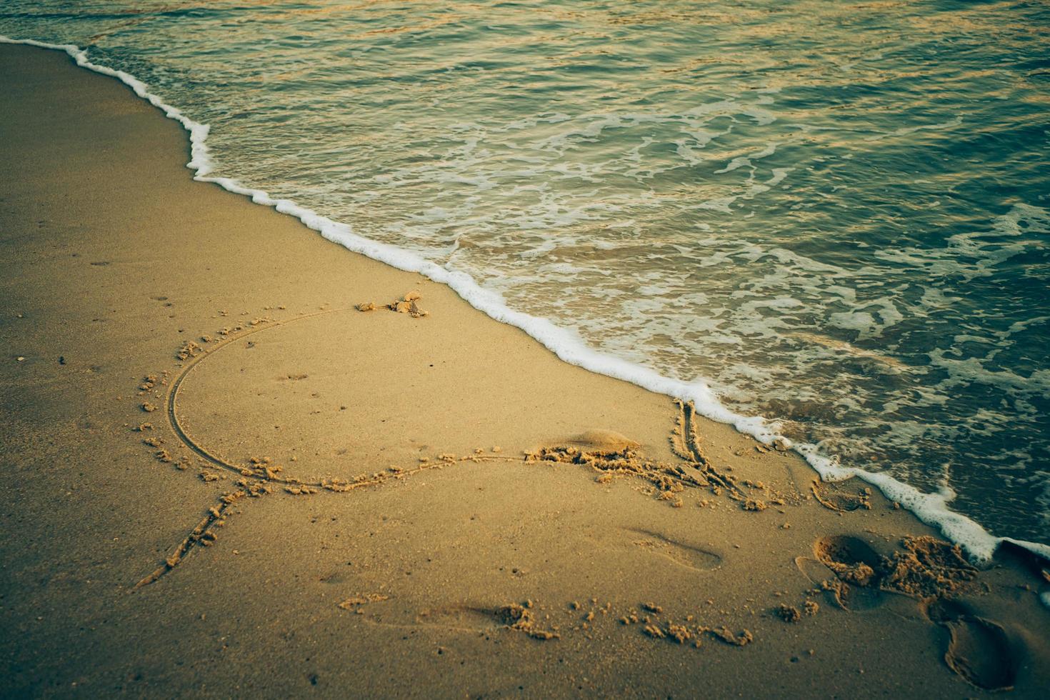 Herz zeichnen Sand Liebe foto