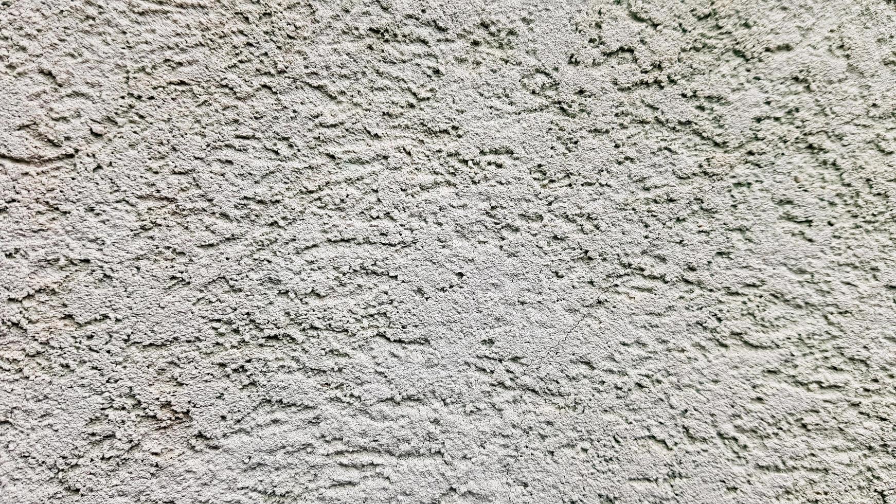 Betonwand Textur. weißer Stuckwandhintergrund. weiß gestrichene zementwand. weiße Betonwand und Boden als Hintergrundtextur. Loft im Stil der Gestaltungsideen eines Wohnhauses. foto