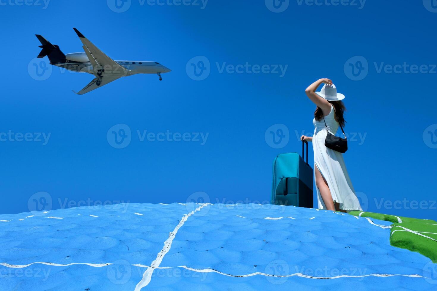 ein jung schön Mädchen im ein Weiß Kleid und ein Hut mit ein Koffer Wellen ihr Hand zu ein fliegend Flugzeug Reise Ferien Freude springen haben Spaß Fräulein das Flugzeug eilen zu verlassen ein Neu Chance im Leben foto