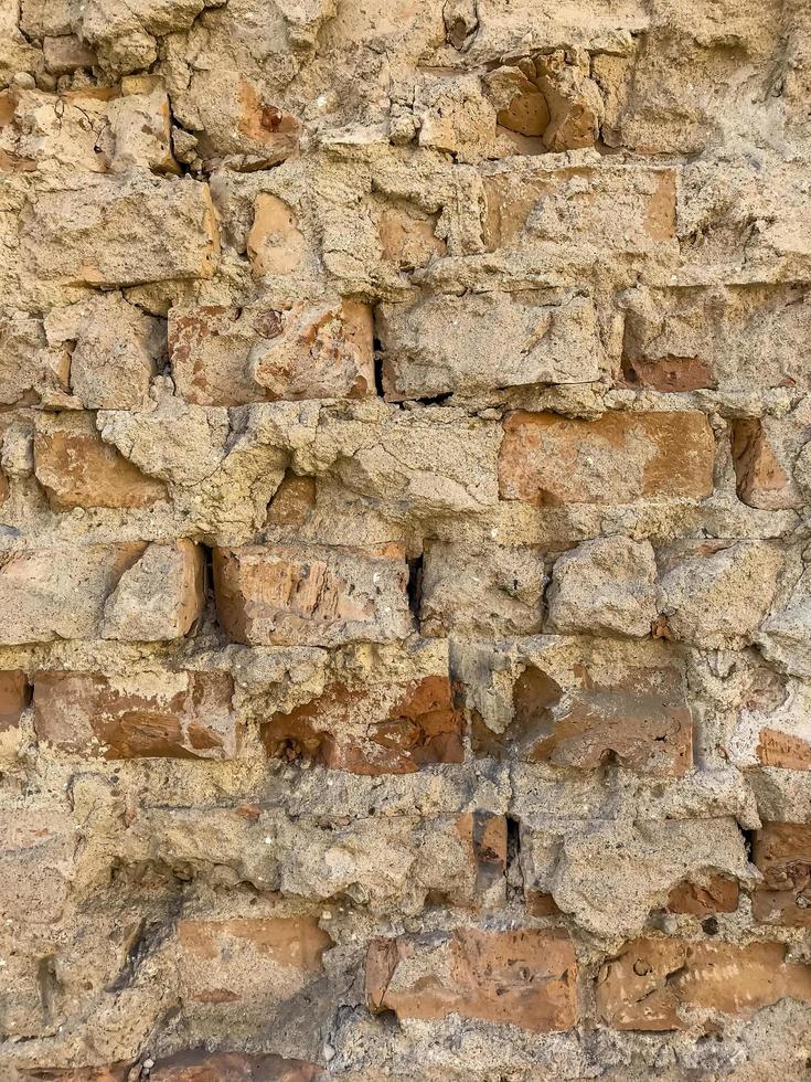 Fragment einer alten Backsteinmauer. Hintergrund, Ziegelstruktur foto