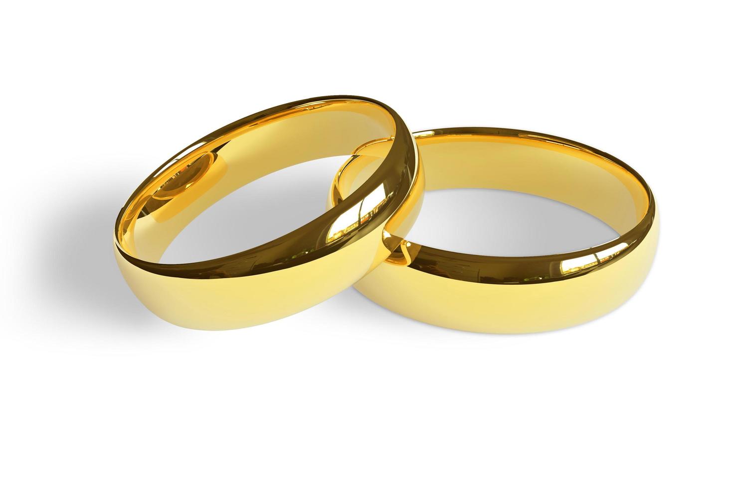 Paar goldene Eheringe abstrakte Luxuslichtkreise Scheinwerferlichteffekt auf Weiß foto