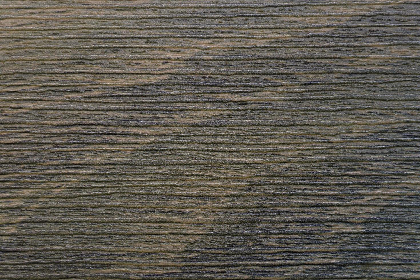 die abstrakte horizontale Oberfläche des glatten Sperrholzes in Braun für ein Hintergrundmuster. eine detaillierte Elementgrafik für eine kreative Gestaltung. foto