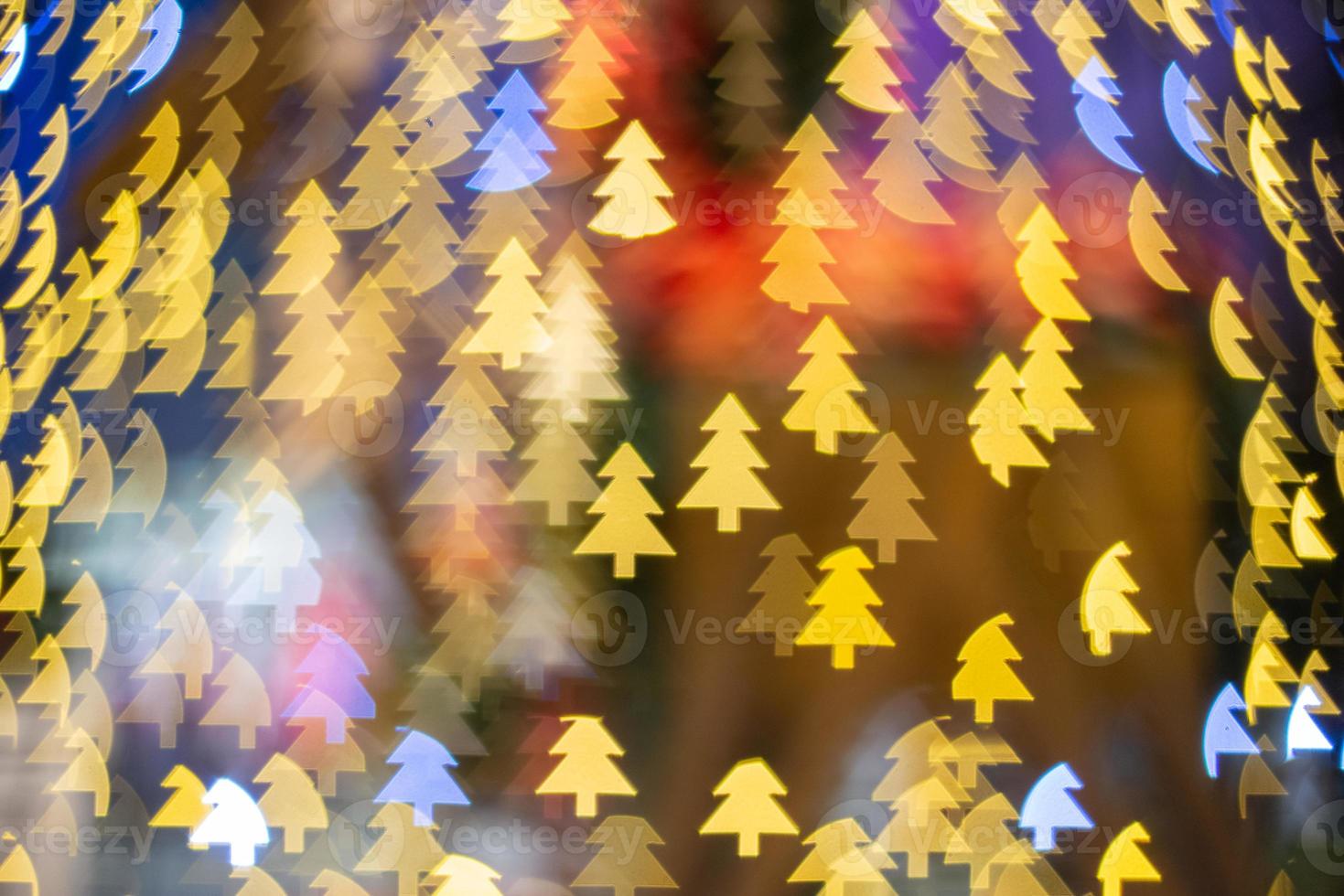 Weihnachtsbaum-Logo in Bokeh verwischen foto