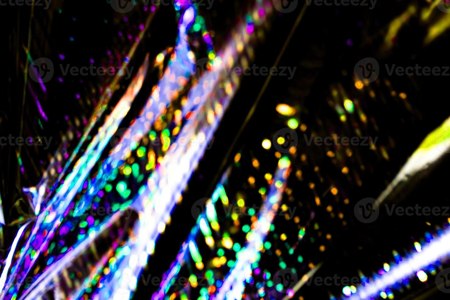 hellblaue Neon abstrakte Textur dunkler Kreis buntes Lichtmuster auf Schwarz. foto