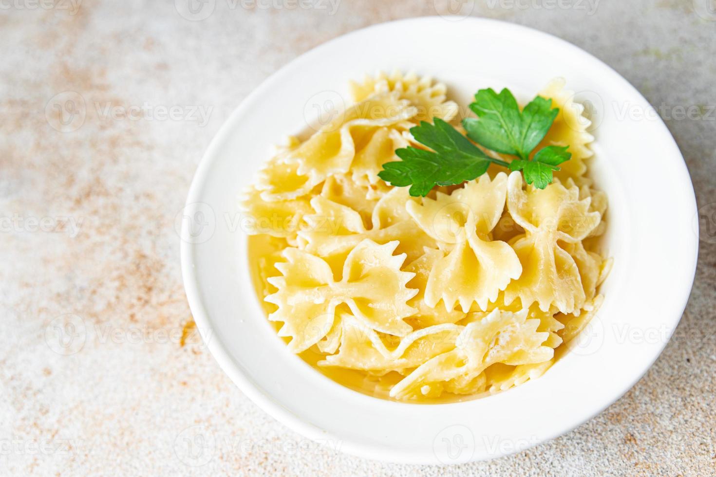 Farfalle Pasta Hartweizenbögen bilden Essen Hintergrund foto