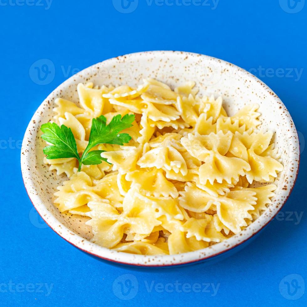 Farfalle Pasta Hartweizenbögen bilden Essen Hintergrund foto