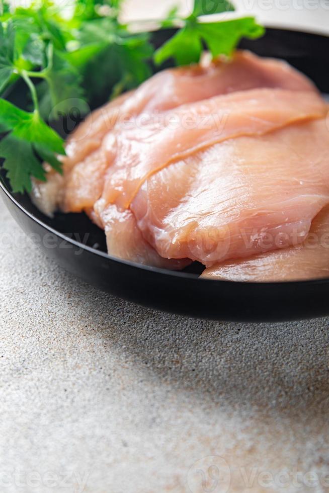 rohe Hühnerstreifen Brustscheiben Geflügelfleisch Mahlzeit Diät Snack Hintergrund foto