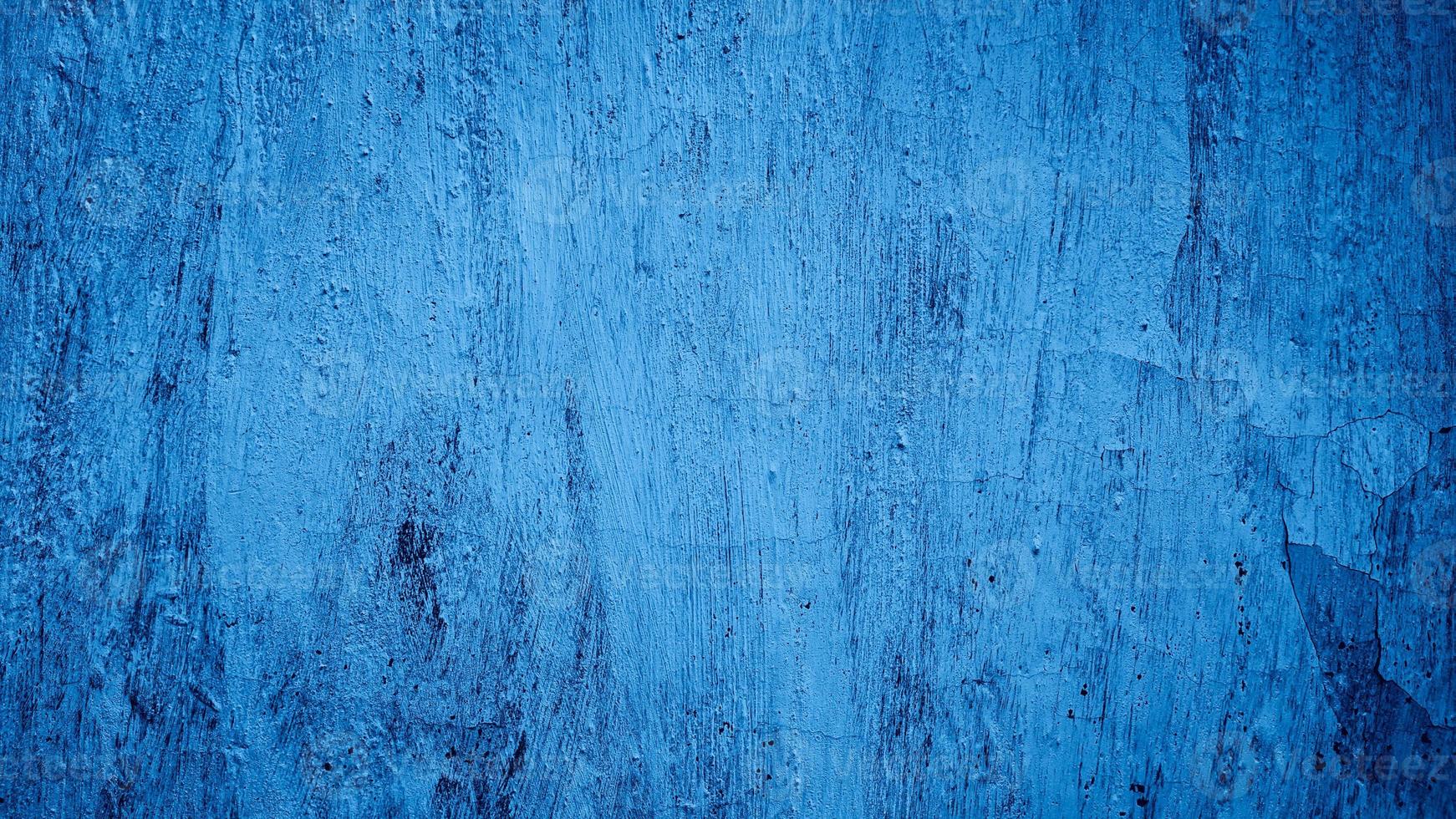 blauer abstrakter verputzter Zementbetonwandbeschaffenheitshintergrund foto