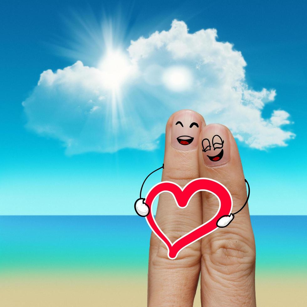 Fingerfamilie reist am Strand und Familienwort foto