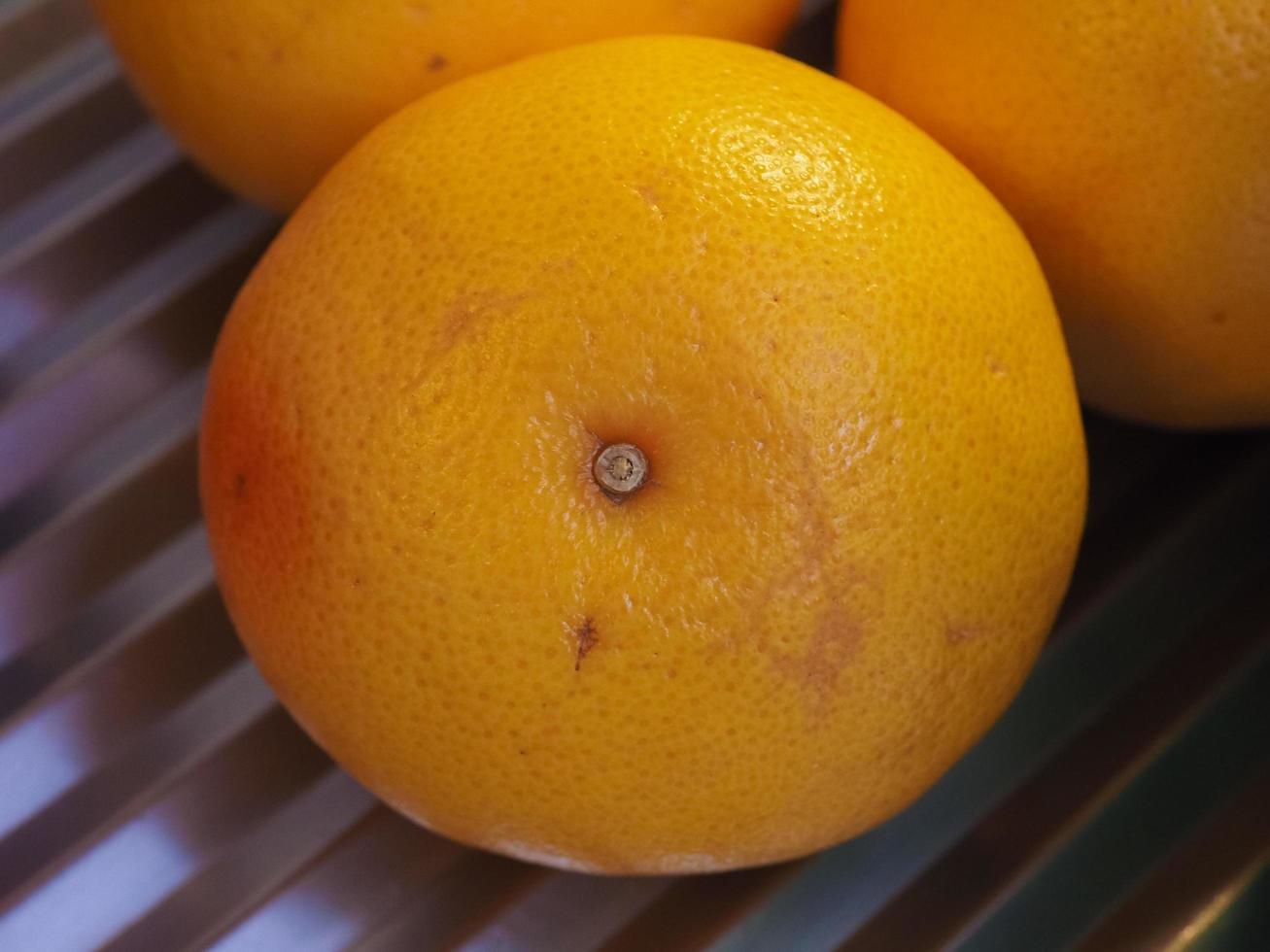 Orangenfrucht essen foto