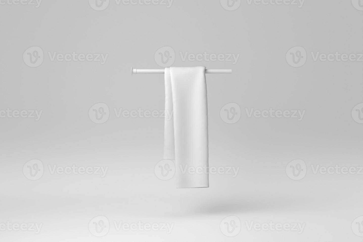 Weiße Frotteehandtücher aus Baumwolle, die auf einem weißen Hintergrund hängen. minimales Konzept. einfarbig. 3D-Rendering. foto