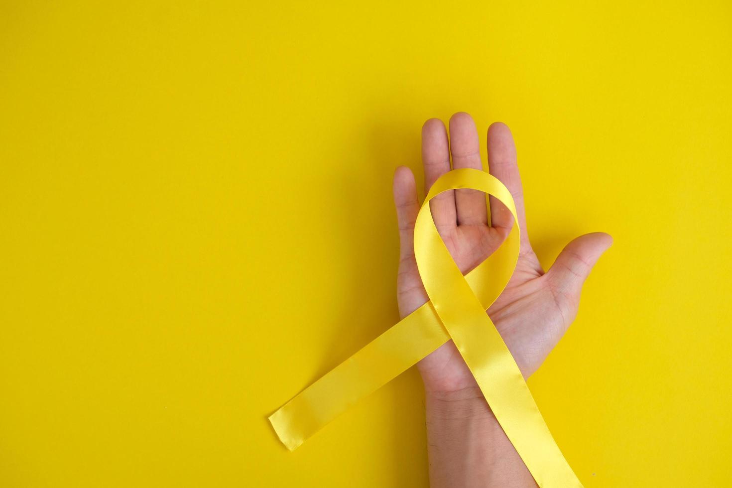 Ribbon ist ein internationales Zeichen für HIV und Aids-Bewusstsein, das Thema Gesundheitsversorgung mit Weltkrebstag foto