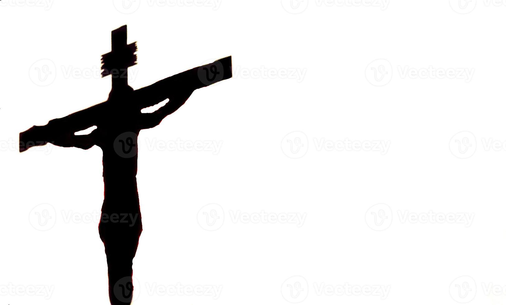 Silhouette des gekreuzigten Jesus auf einem weißen Hintergrund. Osterbanner, Copyspace. foto