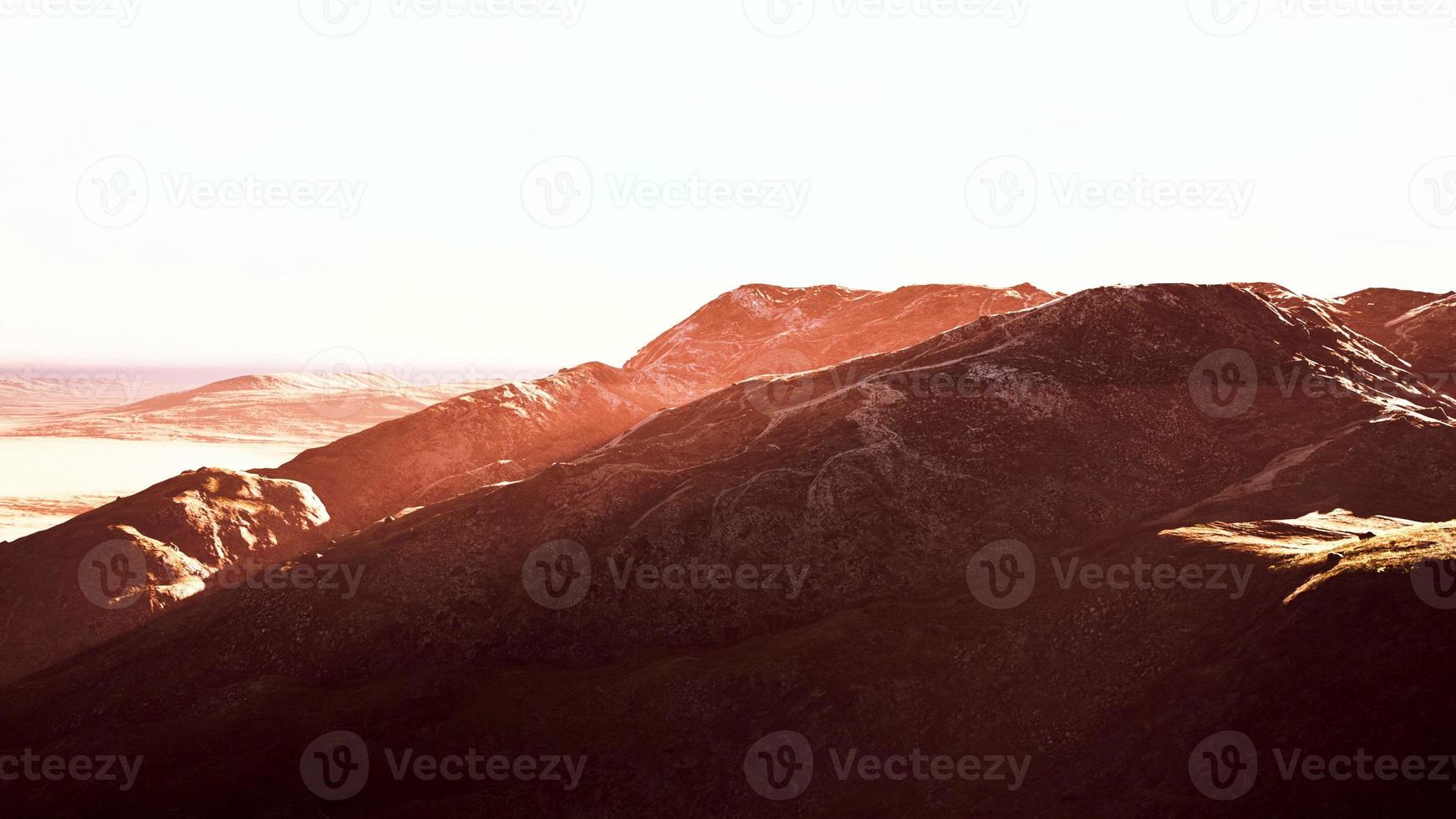 winterliche Berglandschaft bei Sonnenuntergang foto