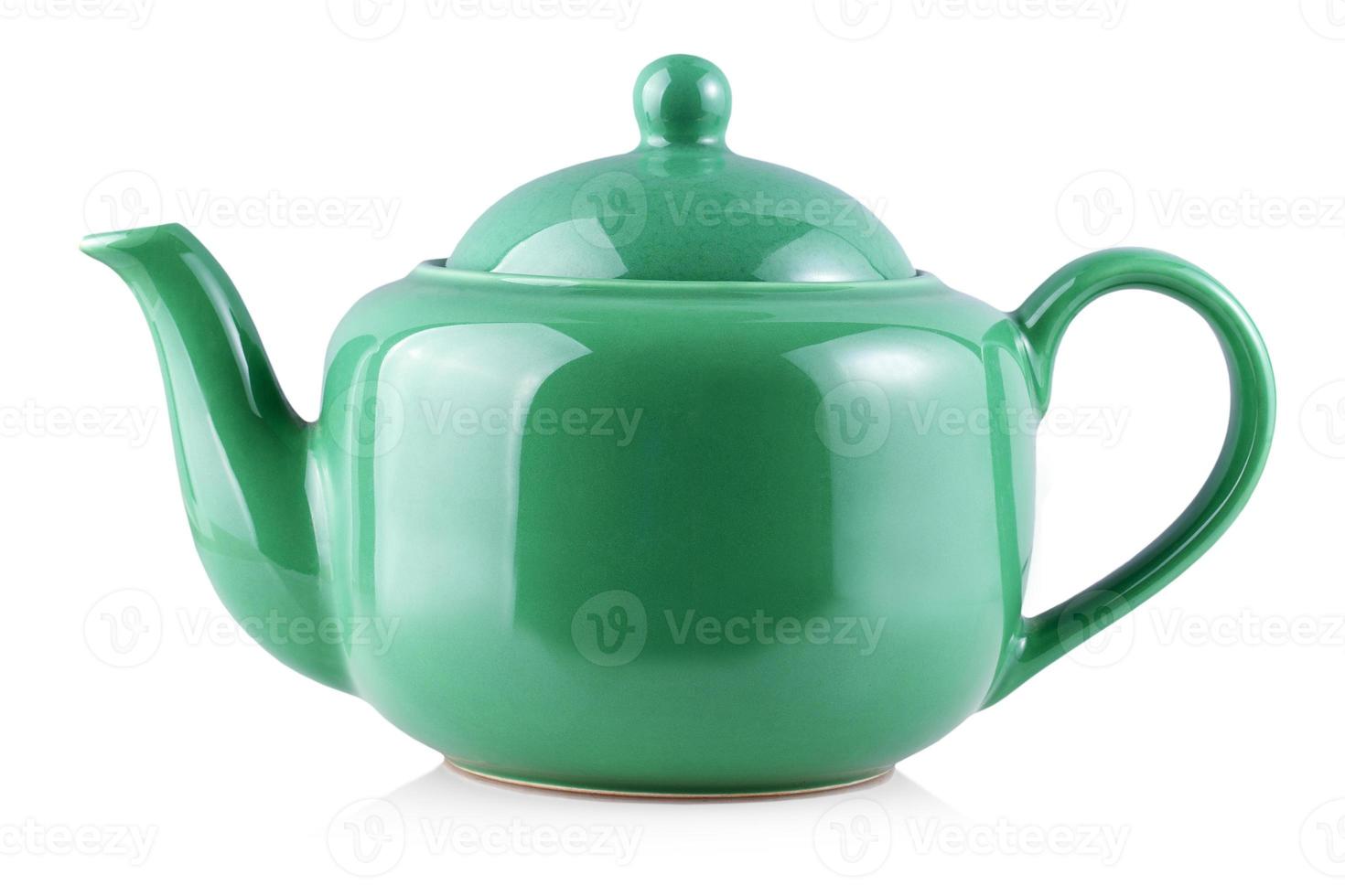 die grüne Teekanne Wasserkocher isoliert auf weißem Hintergrund foto