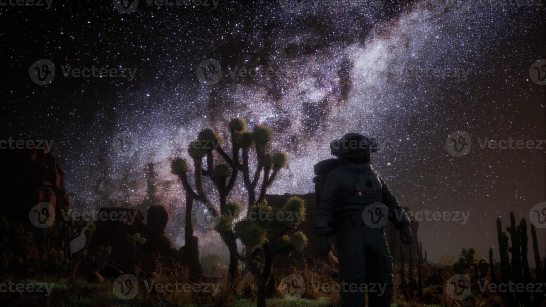 astronauten- und sternenmilchstraßenbildung im death valley foto