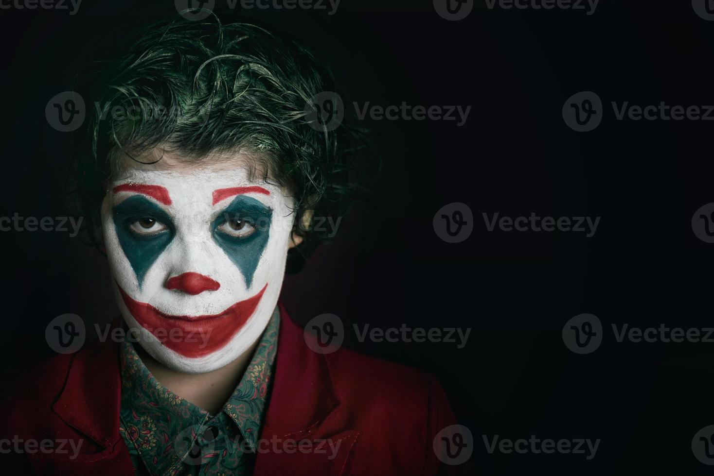 Junge als Joker verkleidet foto