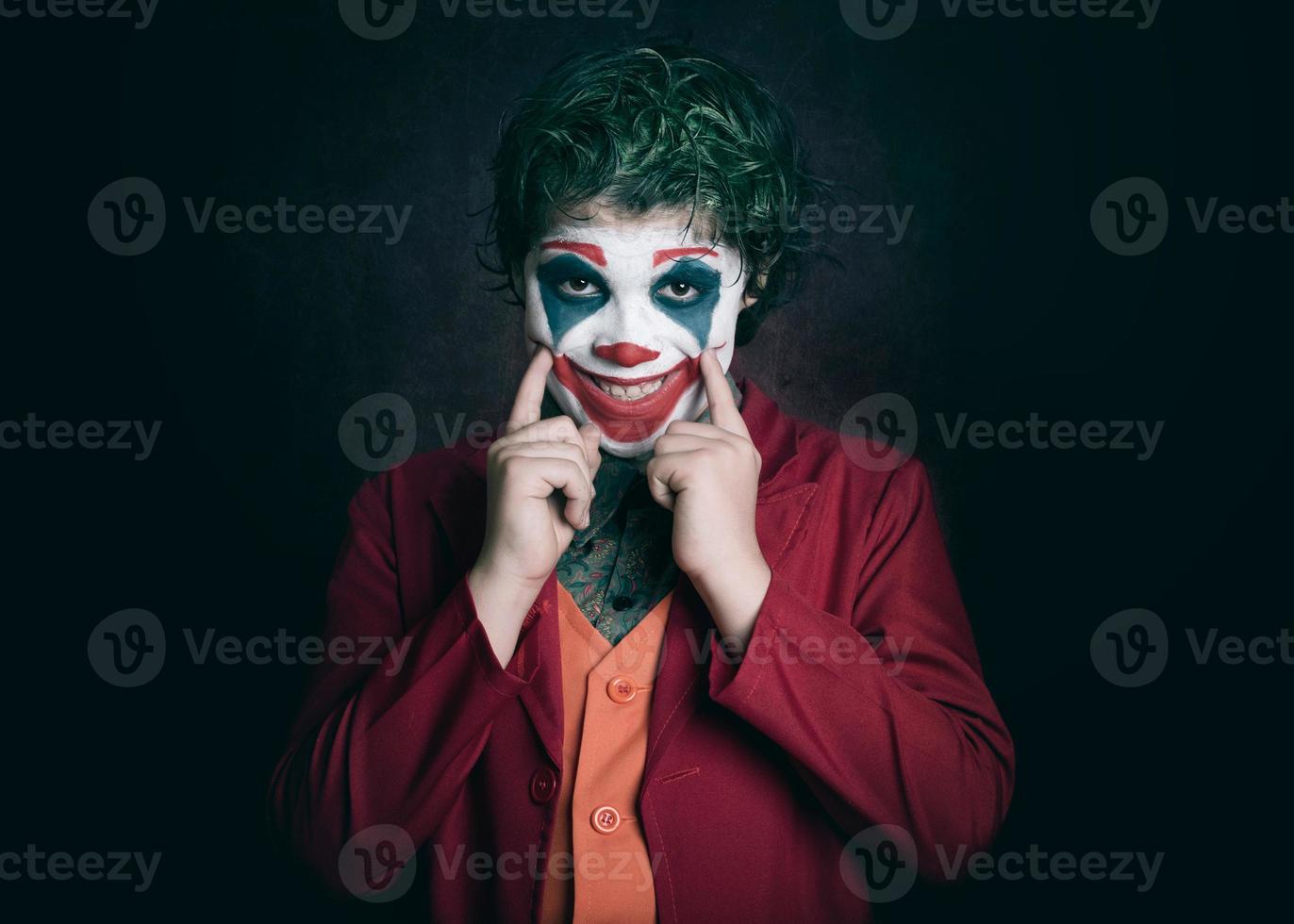 Junge als Joker verkleidet foto