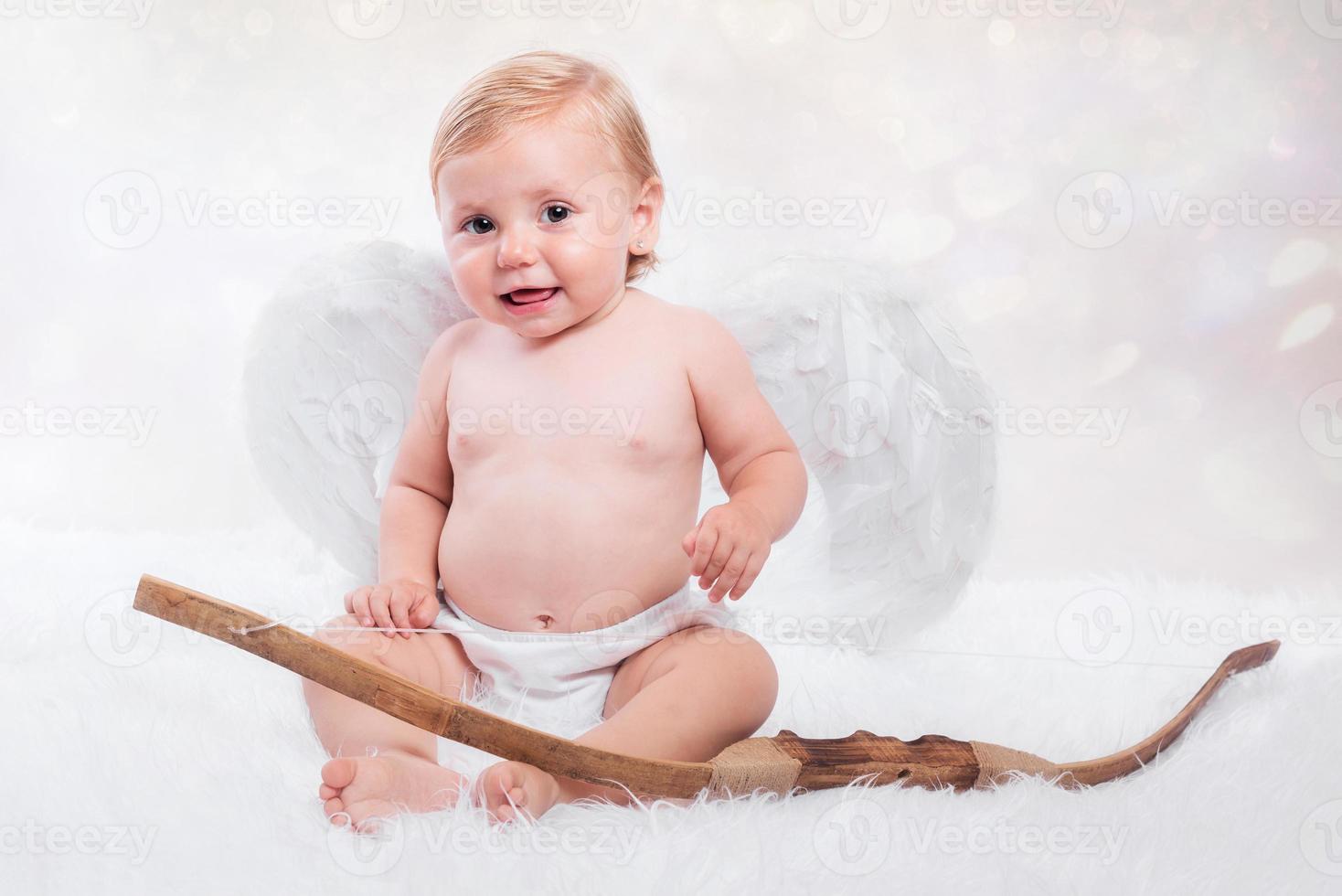 Baby als Engel verkleidet foto