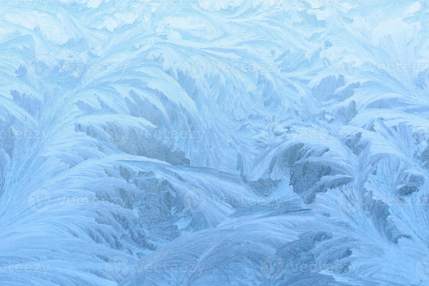 Frostbeschaffenheit auf dem gefrorenen Fenster. foto