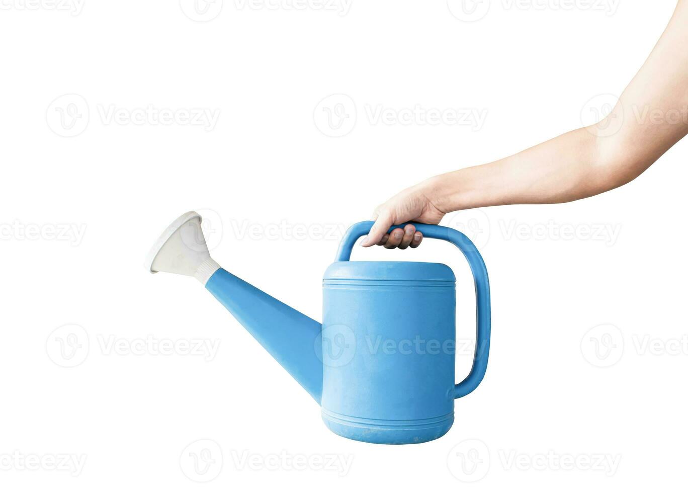 Hand hält eine blaue Gießkanne, isoliert auf weißem Hintergrund mit Beschneidungspfad. Konzept der Gartenarbeit. foto